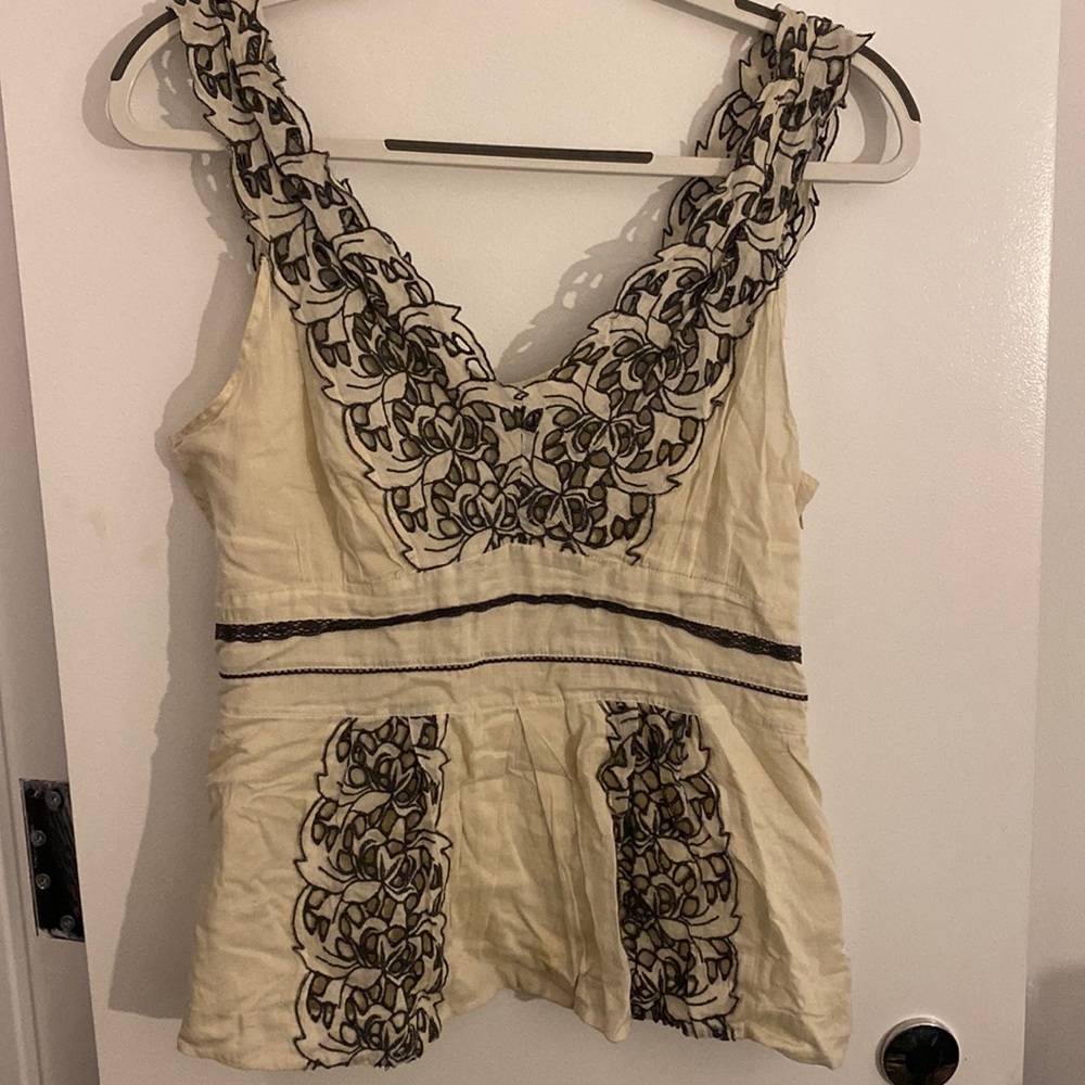 Peplum cream top from Anthropologie